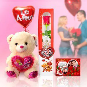 🧸 Oso de peluche con caja de rosas 🌹, globo "Te Amo" y tarjeta personalizada. Un regalo romántico para celebrar.