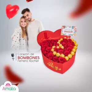 Caja en forma de corazón con rosas rojas y bombones Ferrero Rocher, acompañada de un globo en forma de corazón y pareja feliz de fondo.