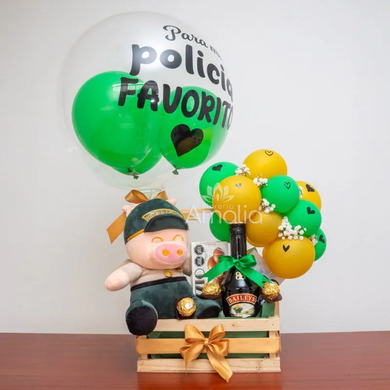 Detalle personalizado para policía 🎈, incluye globo decorativo, 🧸 peluche temático, 🥂 Baileys y 🍫 chocolates Ferrero Rocher. Ideal para sorprender.