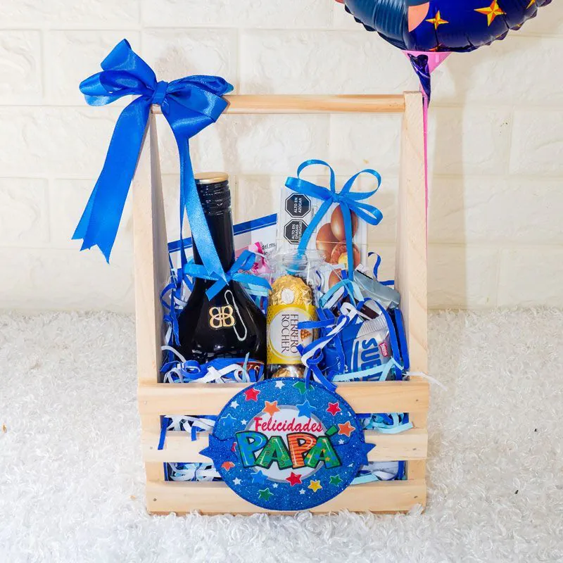 🎁 Canasta regalo Día del Padre con vino, chocolates Ferrero y dulces variados.