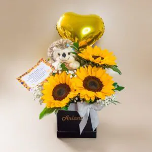 Arreglo de girasoles con peluche y globo dorado en caja negra – Florería Amalia