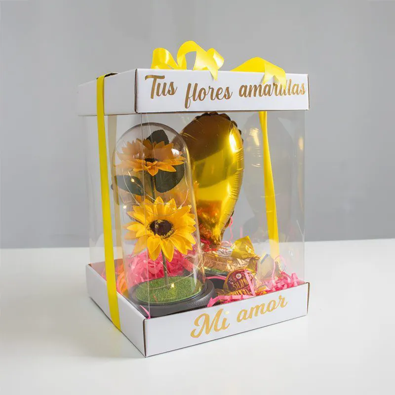 Box “Tus flores amarillas – Mi amor” con cúpula de girasoles y globo corazón dorado
