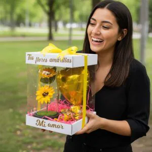 Cliente recibiendo box de flores amarillas con cúpula de girasoles