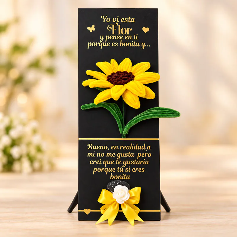 Girasol tejido con mensaje romántico y presentación negra de Florería Amalia