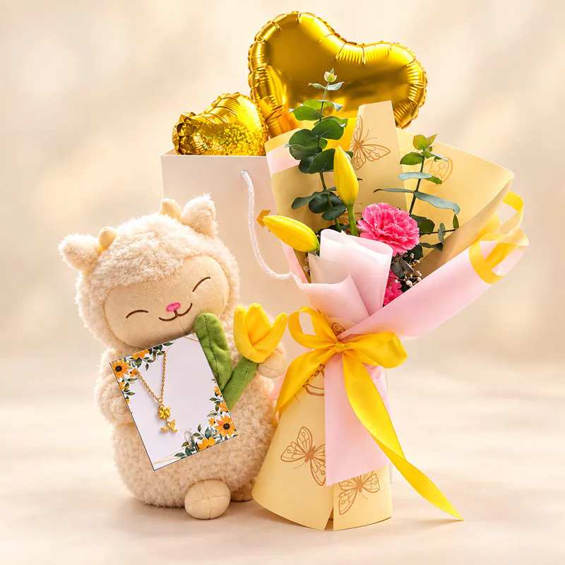Ramo con tulipanes amarillos, peluche, collar y globos dorados de Florería Amalia