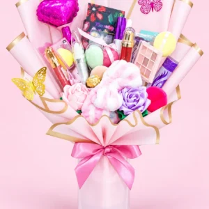 Ramo Glamour: Paletas, cosméticos, esponjas y aplicadores, cintillo afelpado y un bombón.